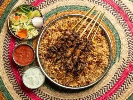 Main tour image for Muscat: Omani Food Tour with Shuwa & Halwa